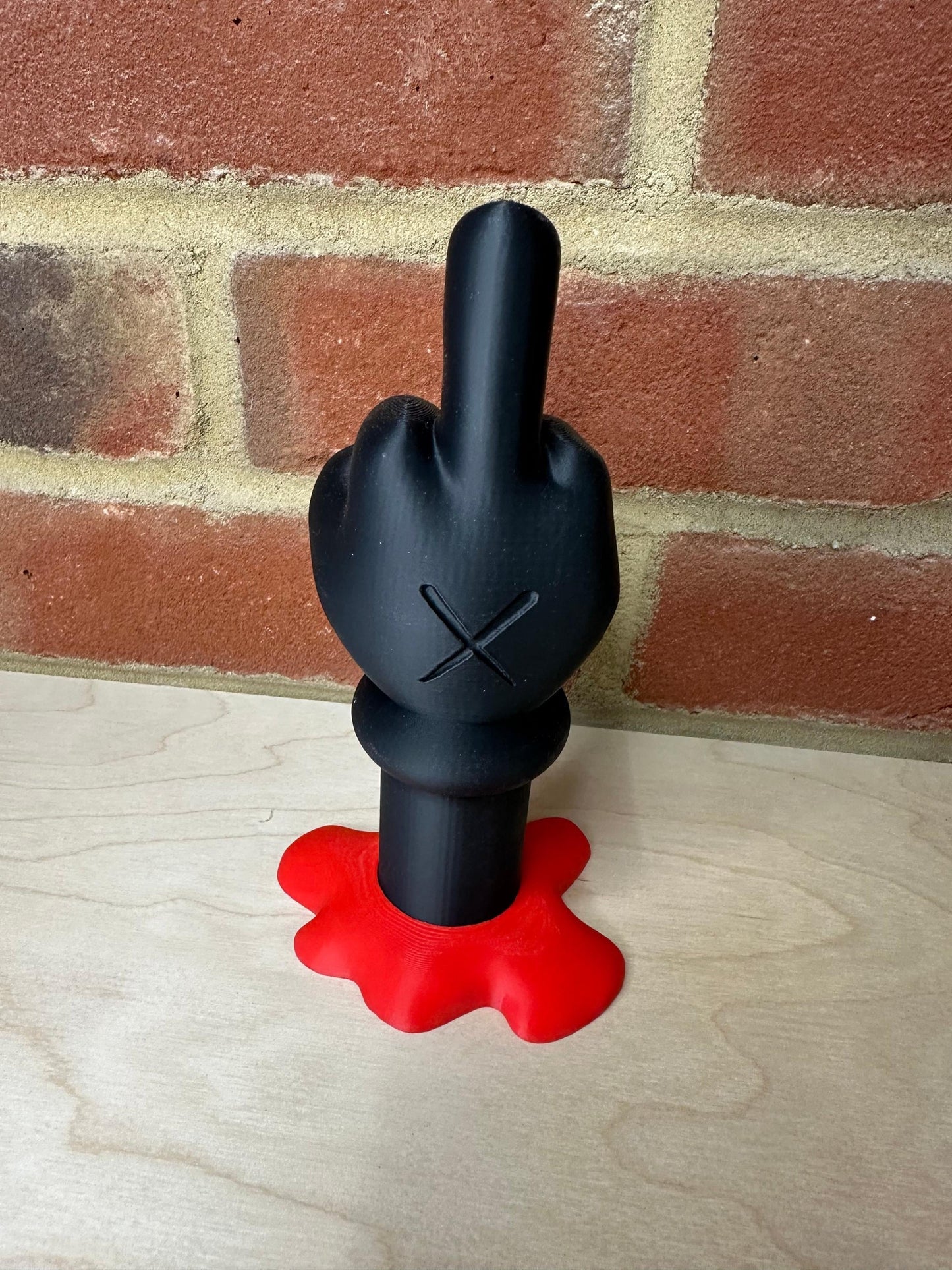 KAWS-Inspired Black  Sculpture, Modern Art Display with Red Drip Base, Unique Desk Ornament, Bold Gift for Collectors and Art Fans