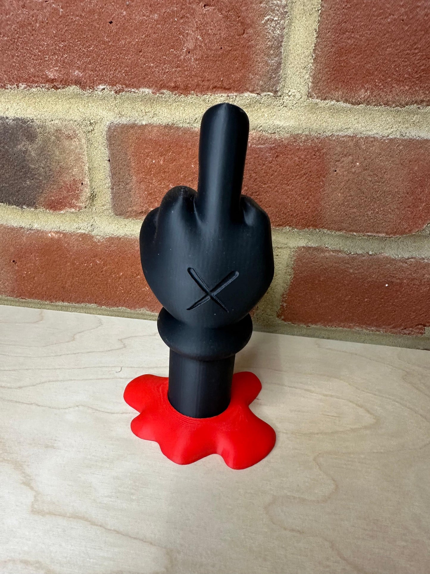 KAWS-Inspired Black  Sculpture, Modern Art Display with Red Drip Base, Unique Desk Ornament, Bold Gift for Collectors and Art Fans