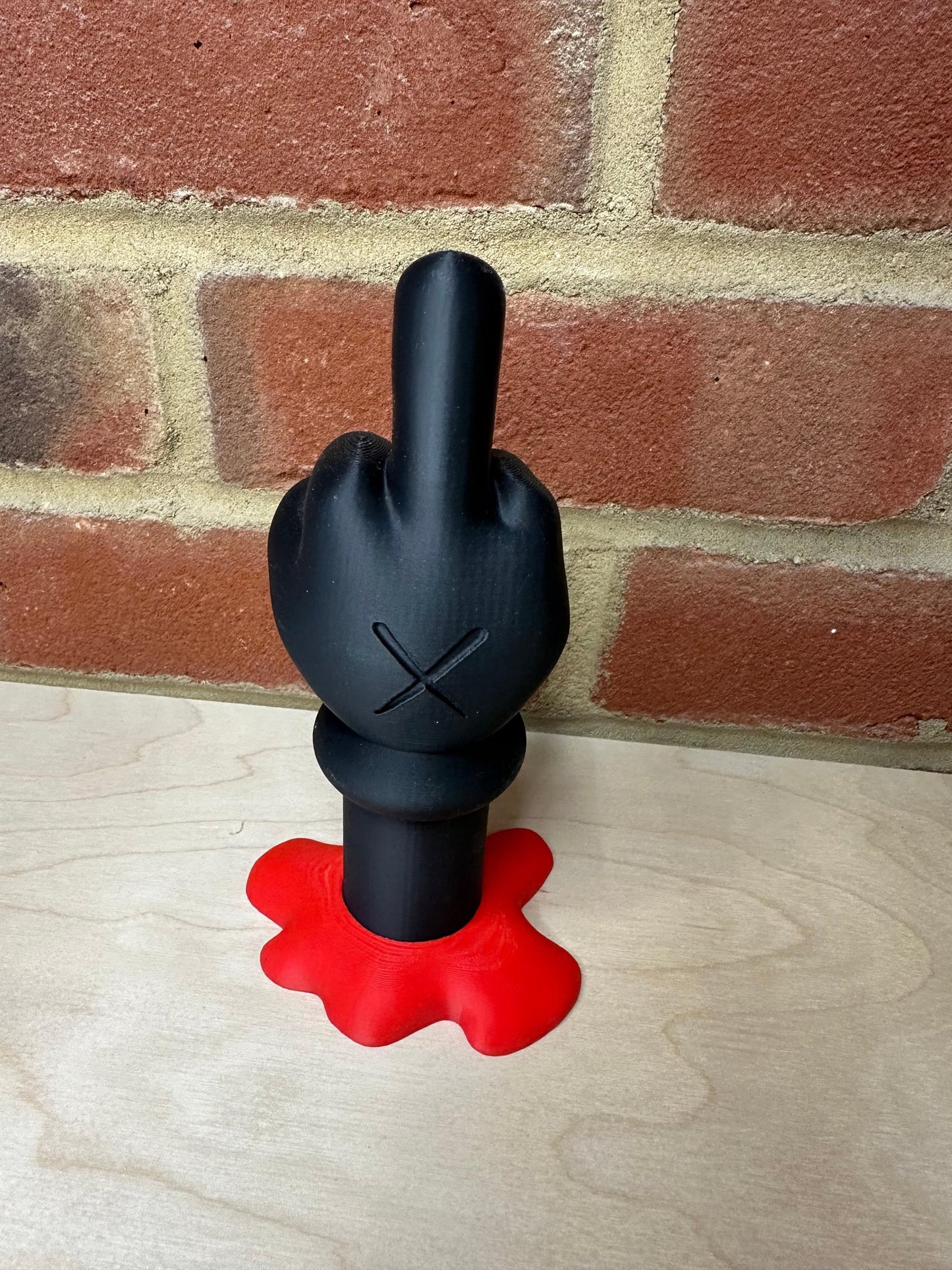 KAWS-Inspired Black  Sculpture, Modern Art Display with Red Drip Base, Unique Desk Ornament, Bold Gift for Collectors and Art Fans